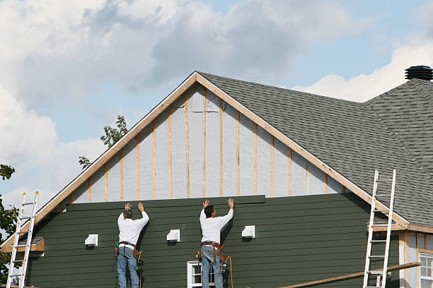Professional Emergency Siding Repair technician working in Terryville, NY